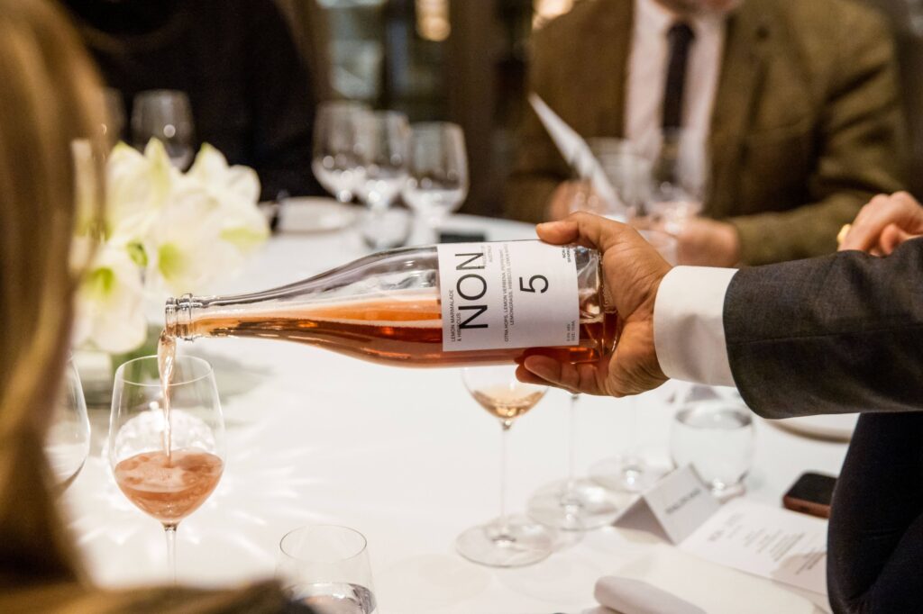 NON 5 Pouring into glass over table